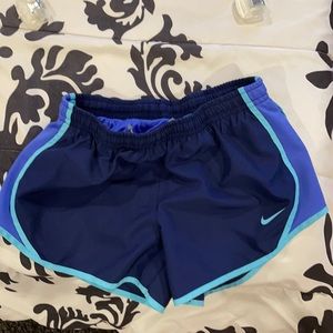 multiple colored blue Nike shorts